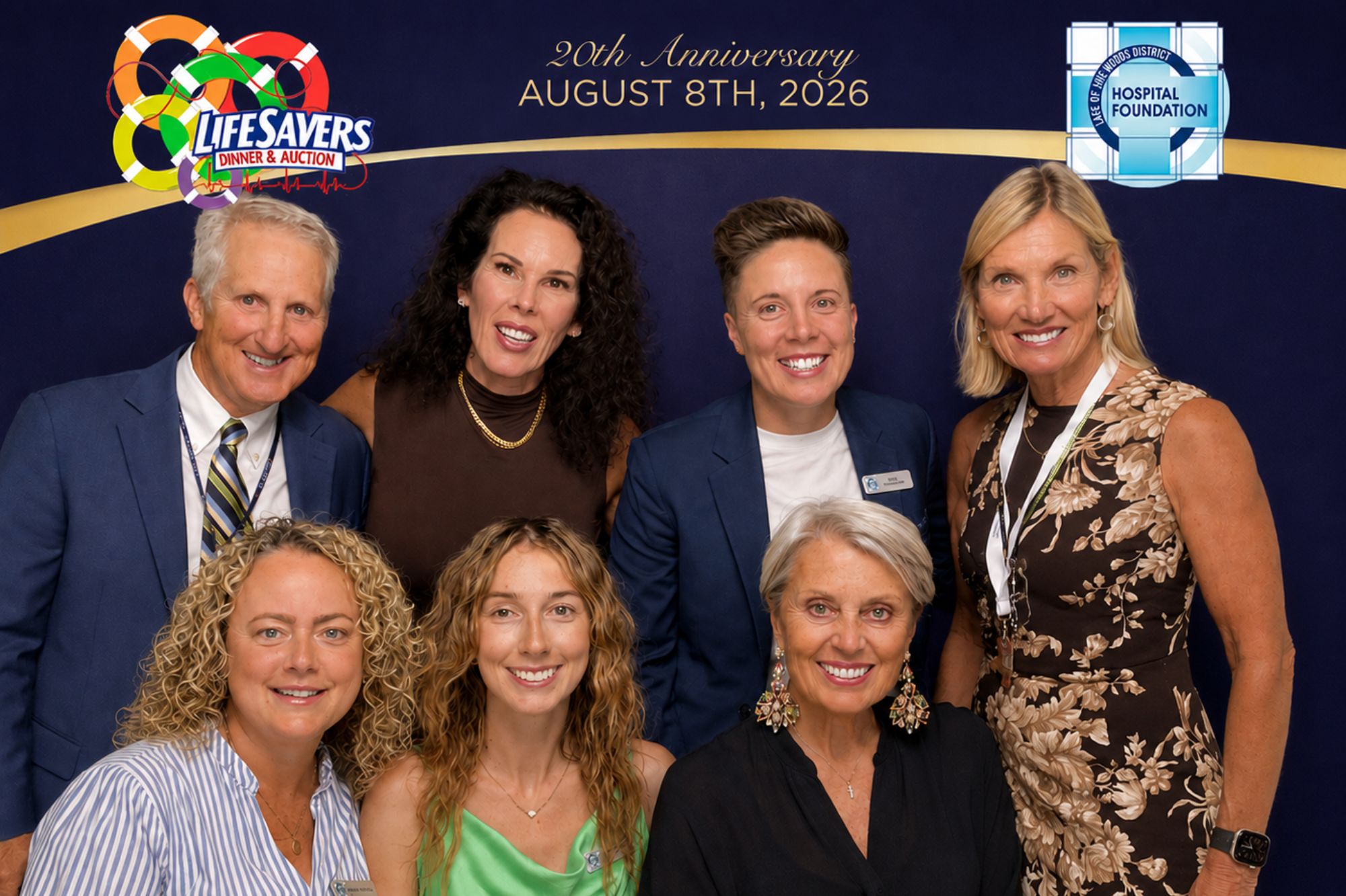 People celebrating the 20th Anniversary of the Lifesavers Dinner and Auction